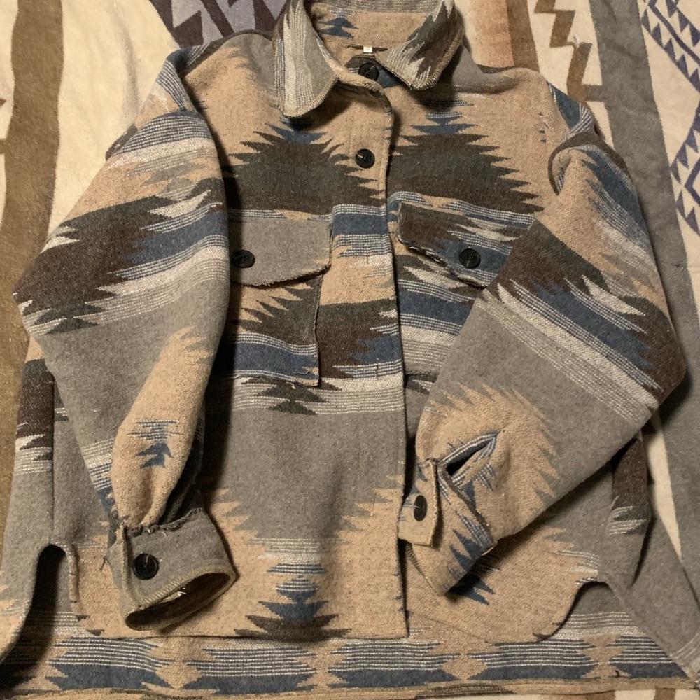 Size small fits like a large Aztec jacket